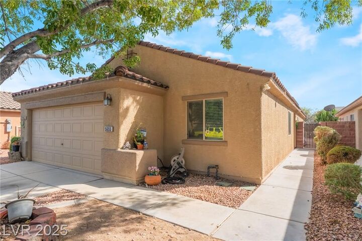 Property Photo: 5655 Crowbush Cove Place NV 89122