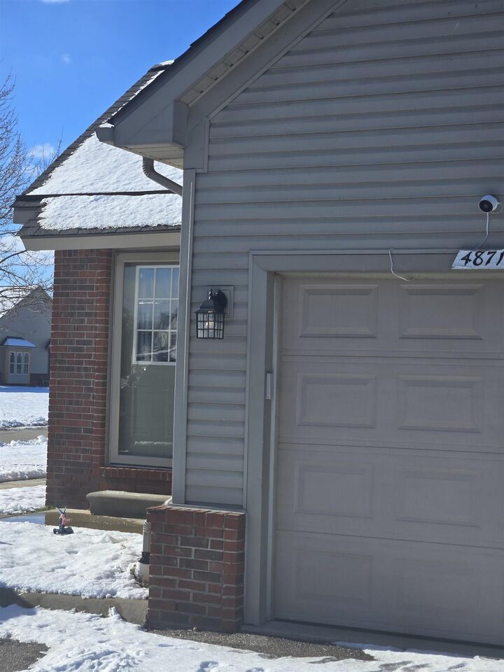 Property Photo: 48713 Chelmsford Court MI 48047