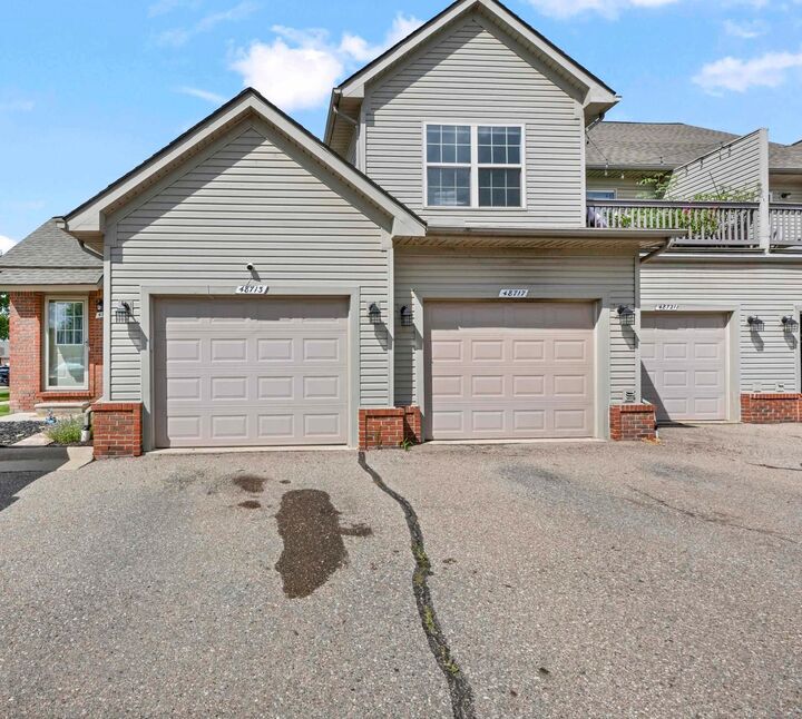 Property Photo: 48713 Chelmsford Court MI 48047