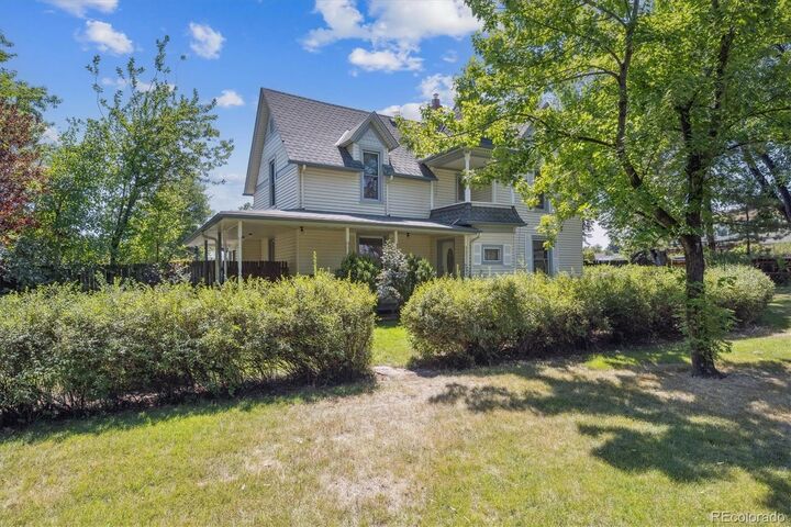 Property Photo: 9000 W Jewell Avenue CO 80232