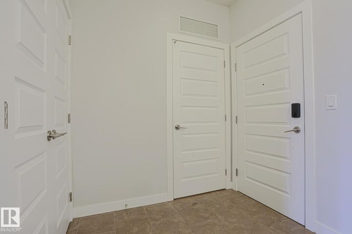 Property Photo: 10530 56 Avenue NW 205 AB T6H 0X7