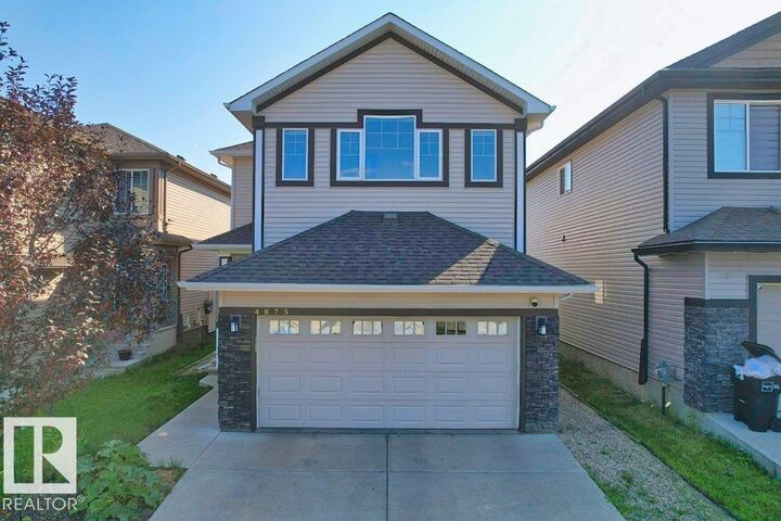 Property Photo: 4875 Wright Drive SW AB T6W 3K2