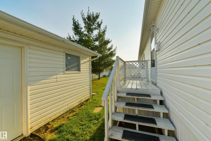 Property Photo: 2835 Lakeside Close NW AB T5S 1T7