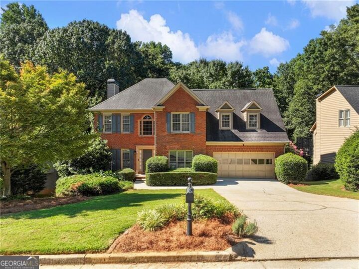 Property Photo:  5575 Ashwind Trace  GA 30005 
