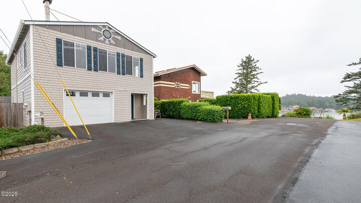 Property Photo: 203 SE Surf Avenue OR 97367