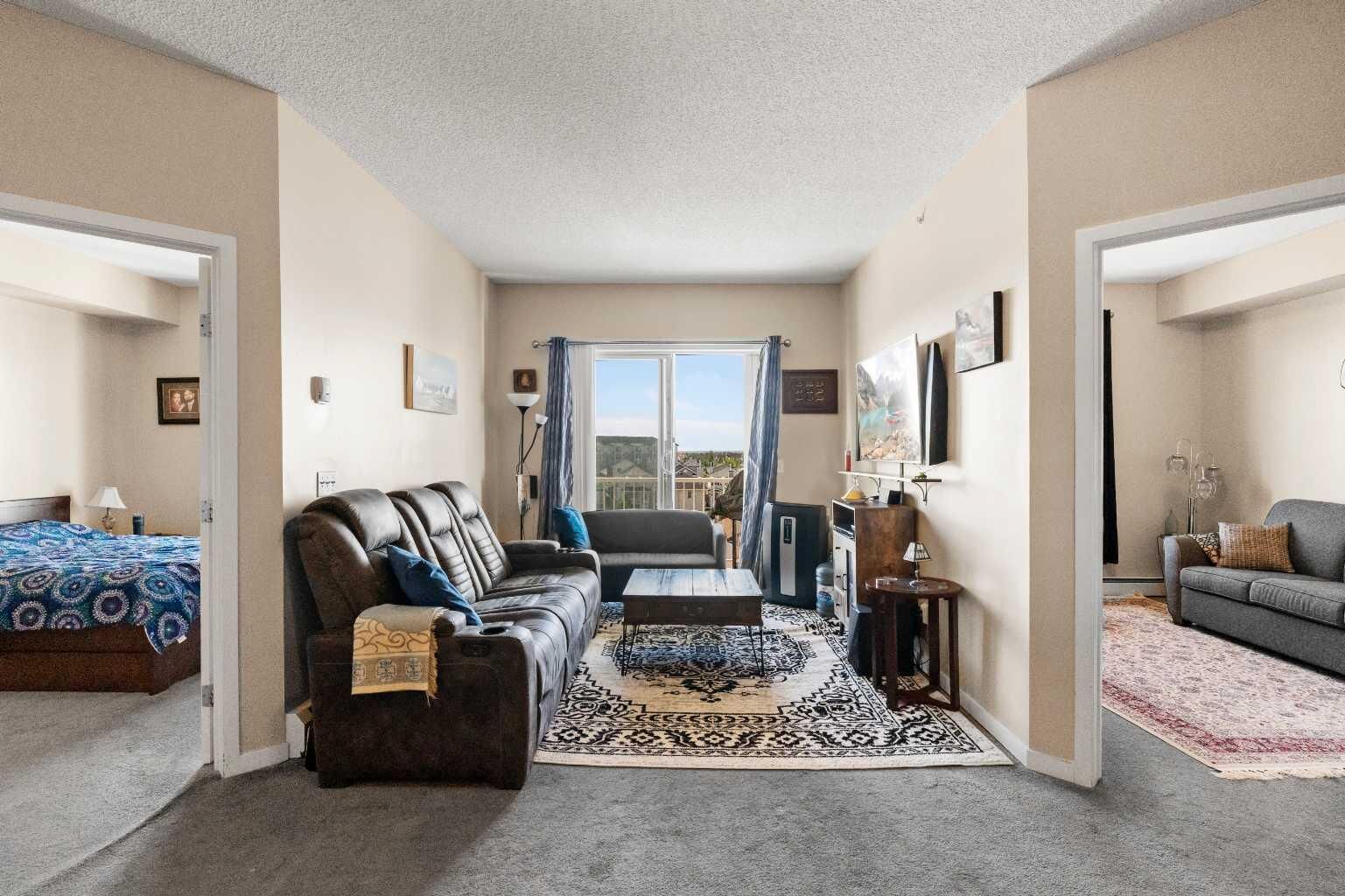 Property Photo:  1140 Taradale Drive NE 1404  AB T3J 0G1 