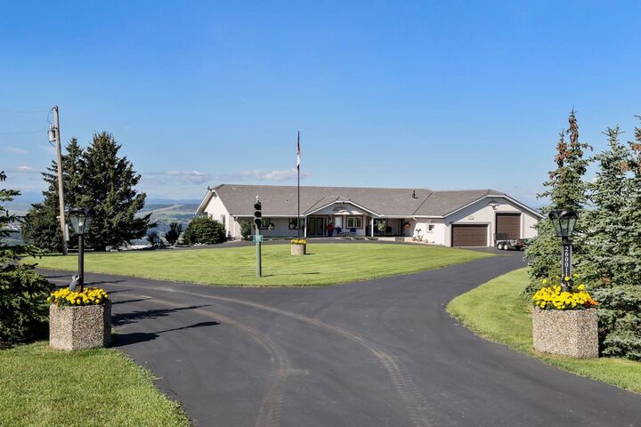 Property Photo:  260011 Mountain Ridge Place  AB T3C 0B7 