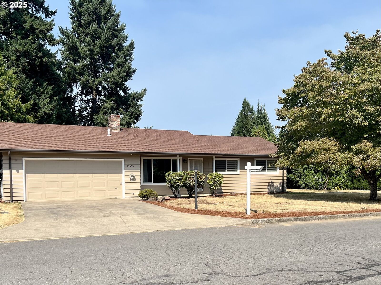 Property Photo: 14648 SE Tamarack Way OR 97267