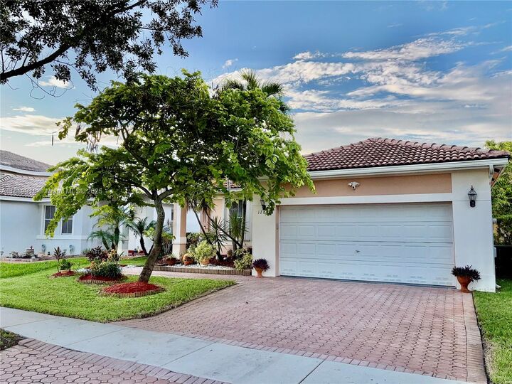 Property Photo: 12899 SW 27th St FL 33027