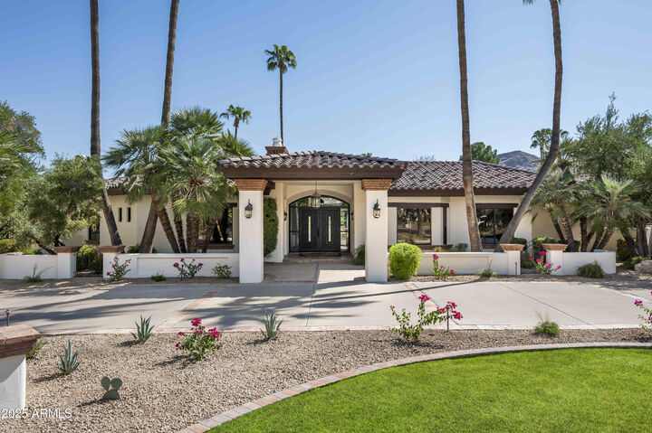 Property Photo:  8901 N 58th Place  AZ 85253 