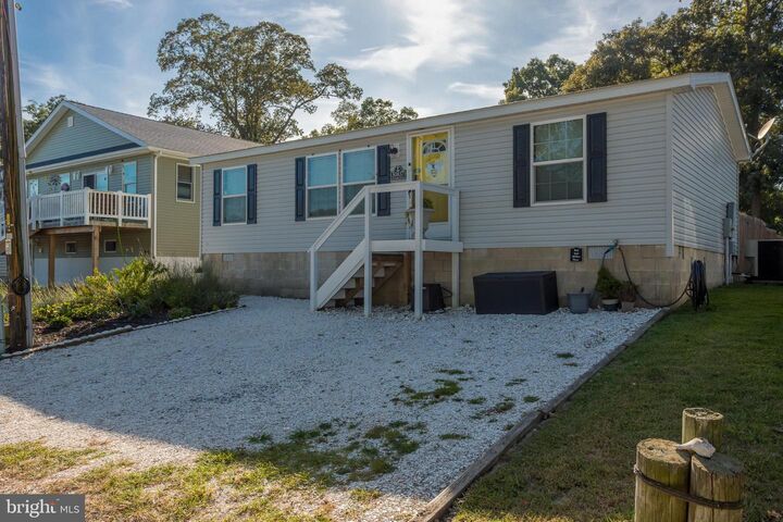 Property Photo: 30837 W Lagoon Road DE 19939