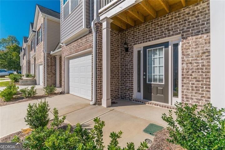 Property Photo:  7162 Fringe Flower Drive  GA 30168 