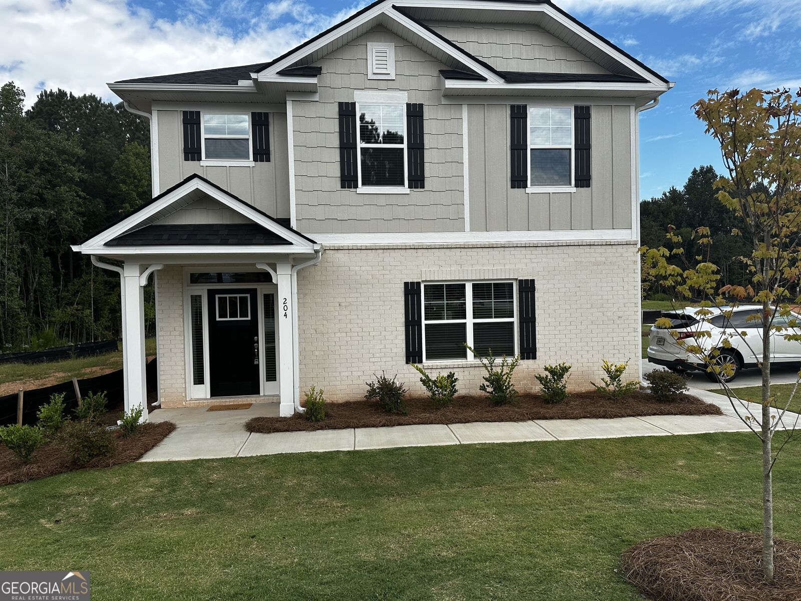 Property Photo:  204 Chaucer Lane  GA 30117