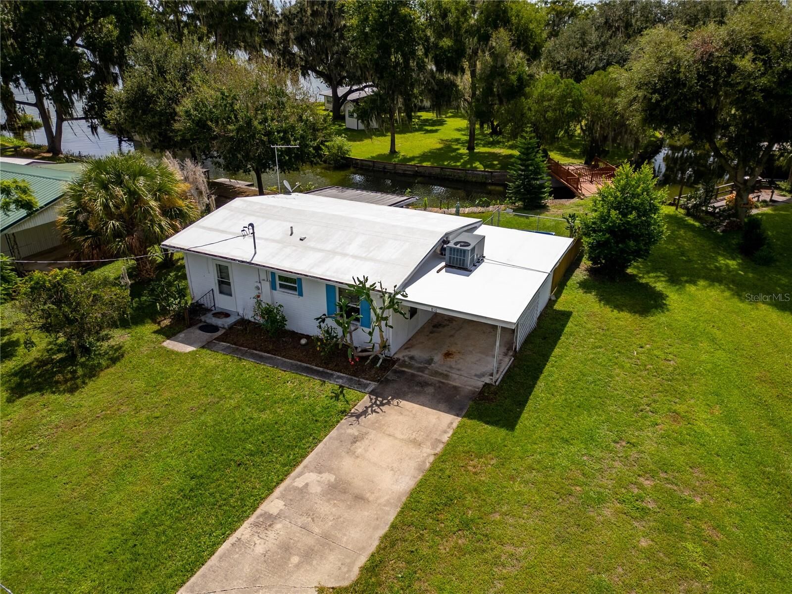 Property Photo:  810 Cr 457  FL 33538 