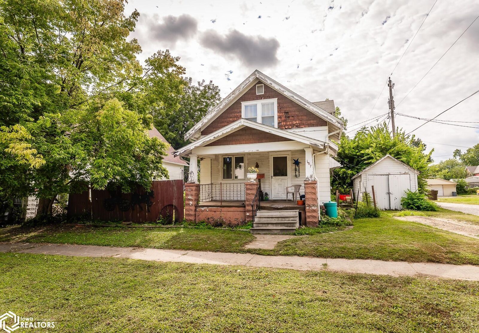 Property Photo:  107 S 5th Street  IA 50158 