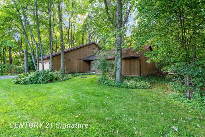 Property Photo: 1830 W Lake Circle Drive MI 48609