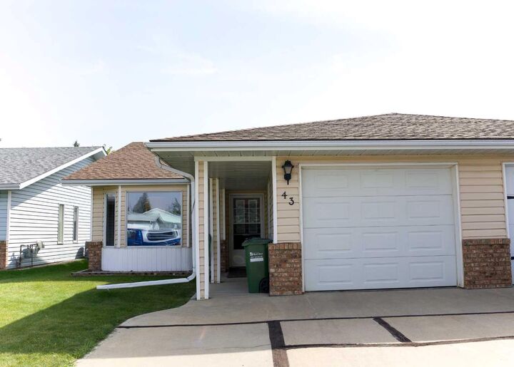 Property Photo: 43 Ellis Street N AB T4R 2C8