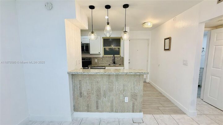 Property Photo:  13101 Memorial Hwy 104  FL 33161