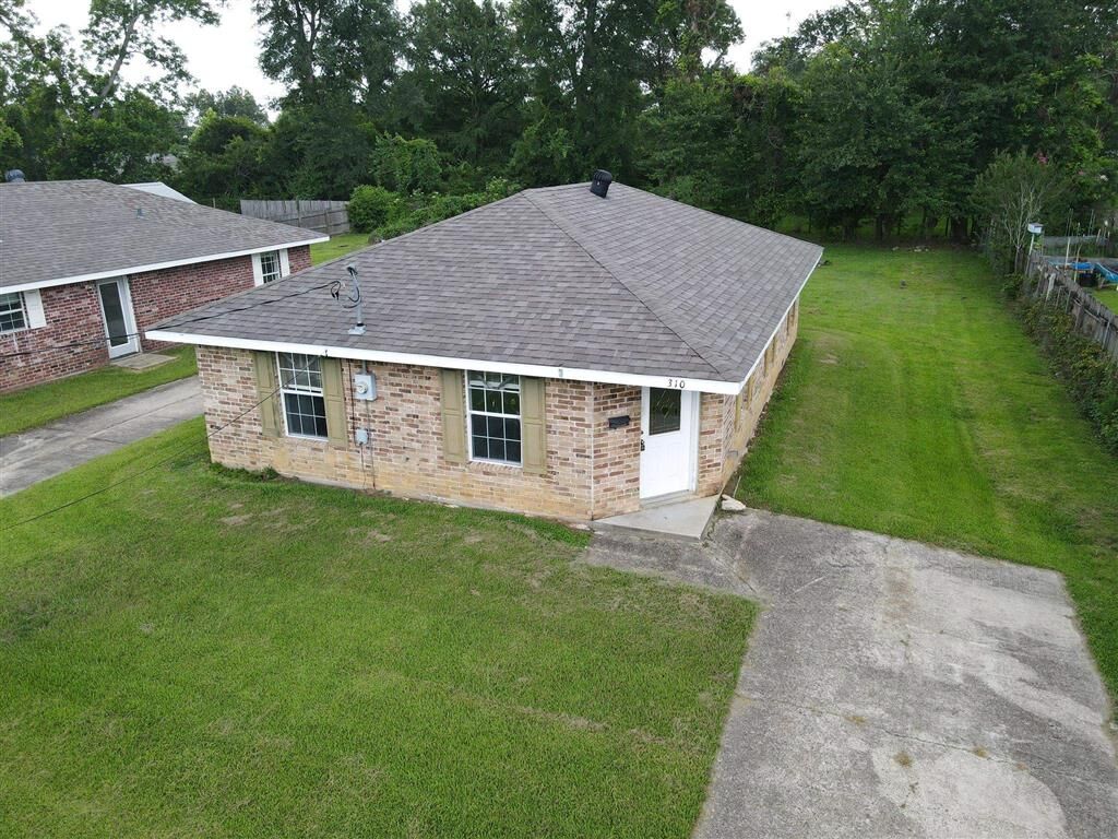 Property Photo:  310 Coffee Street  LA 70633 