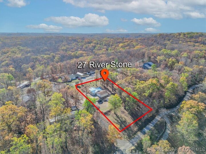 Property Photo:  27 River Stone  MO 65020 