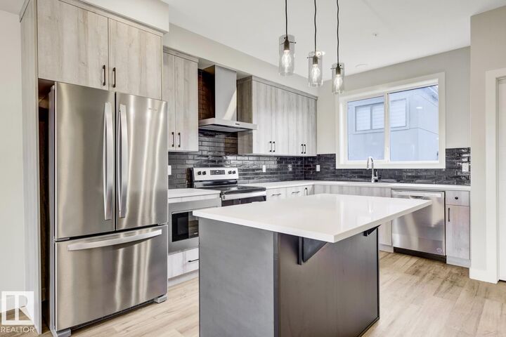 Property Photo: 8063 Cedric Mah Road NW AB T5G 2R6
