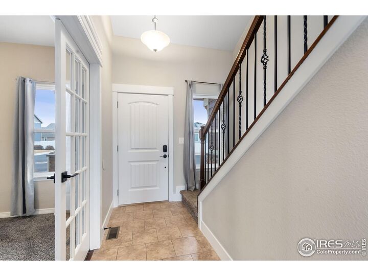 Property Photo:  893 Shirttail Peak Ct  CO 80550