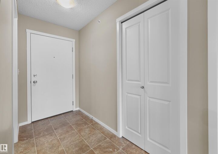 Property Photo: 5816 Mullen Place NW 407 AB T6R 0W3