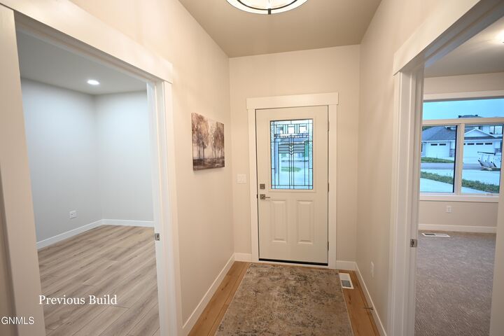 Property Photo:  1825 Community Lp  ND 58503 