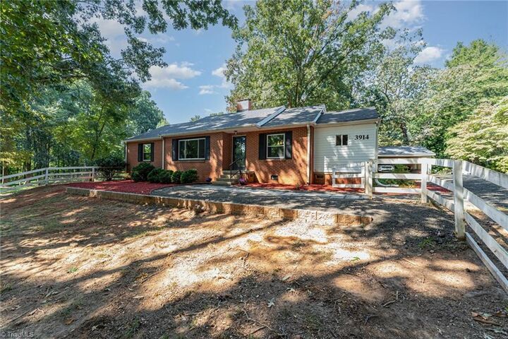 Property Photo:  3914 Blumenthal Road  NC 27406 