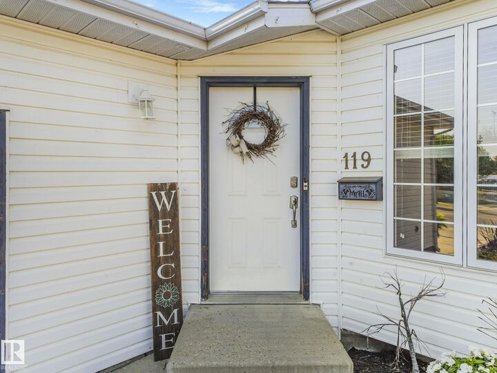 Property Photo:  119 Deer Ridge Drive  AB T8N 6G7 