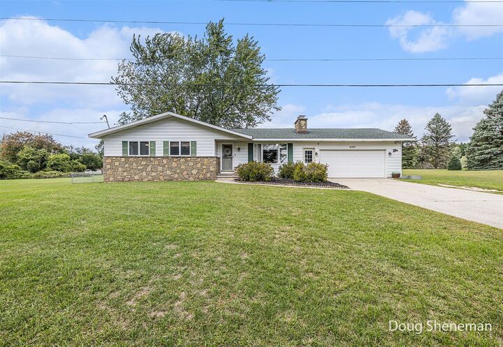 Property Photo:  4707 Cannonsburg Road  MI 49306 