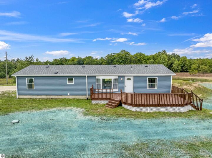 Property Photo:  848 SW Prairie Lane  MI 49646 