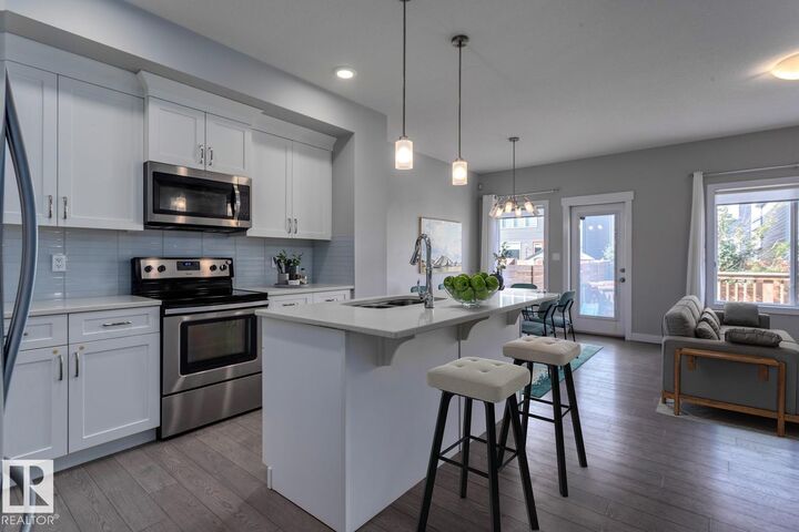Property Photo:  2836 Koshal Crescent SW  AB T6W 3J7 