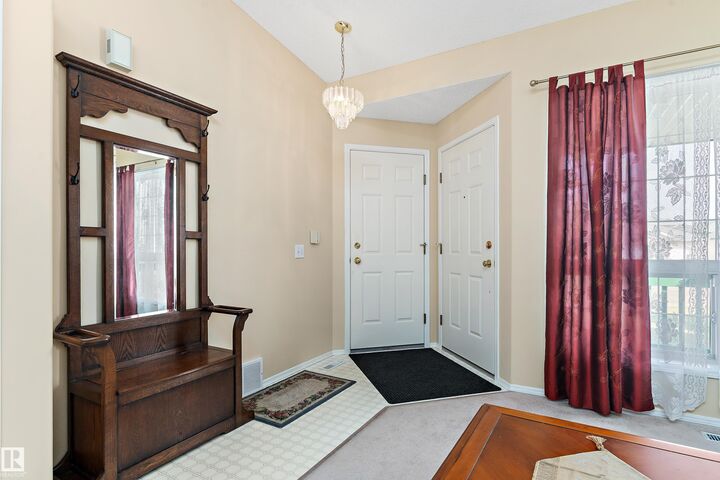 Property Photo:  13148 36 Street NW  AB T5A 5C7 