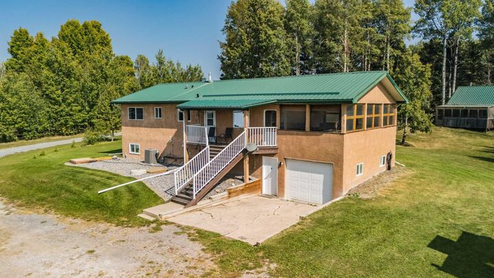 Property Photo: 390050 Range Road 8-4 AB T4T 1B1