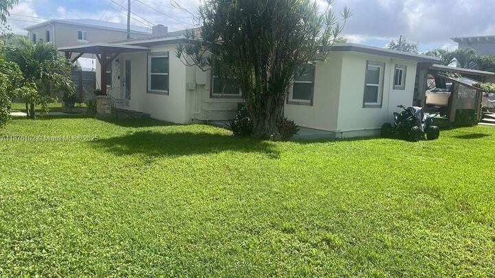 Property Photo: 1129 NW 5th Ave FL 33034