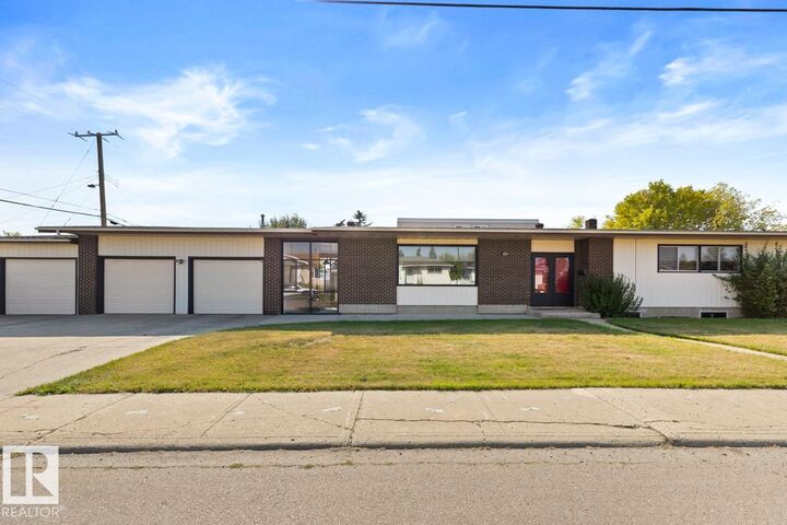 Property Photo:  8007 128 Avenue NW  AB T5C 1T8 