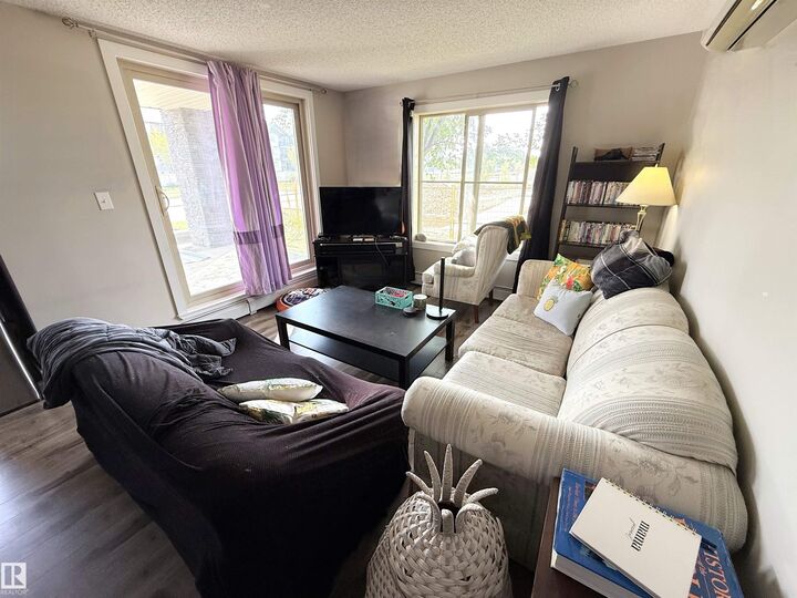 Property Photo:  11803 22 Avenue SW 101  AB T6W 2R9 