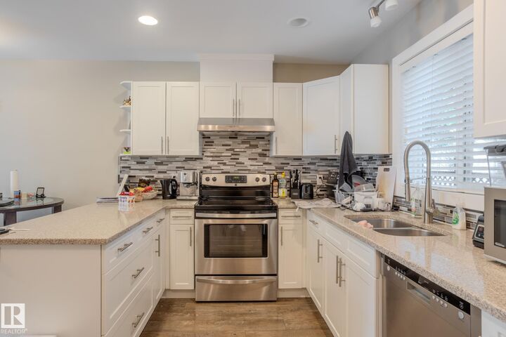 Property Photo:  12504 119 Avenue NW  AB T5L 2Z5 