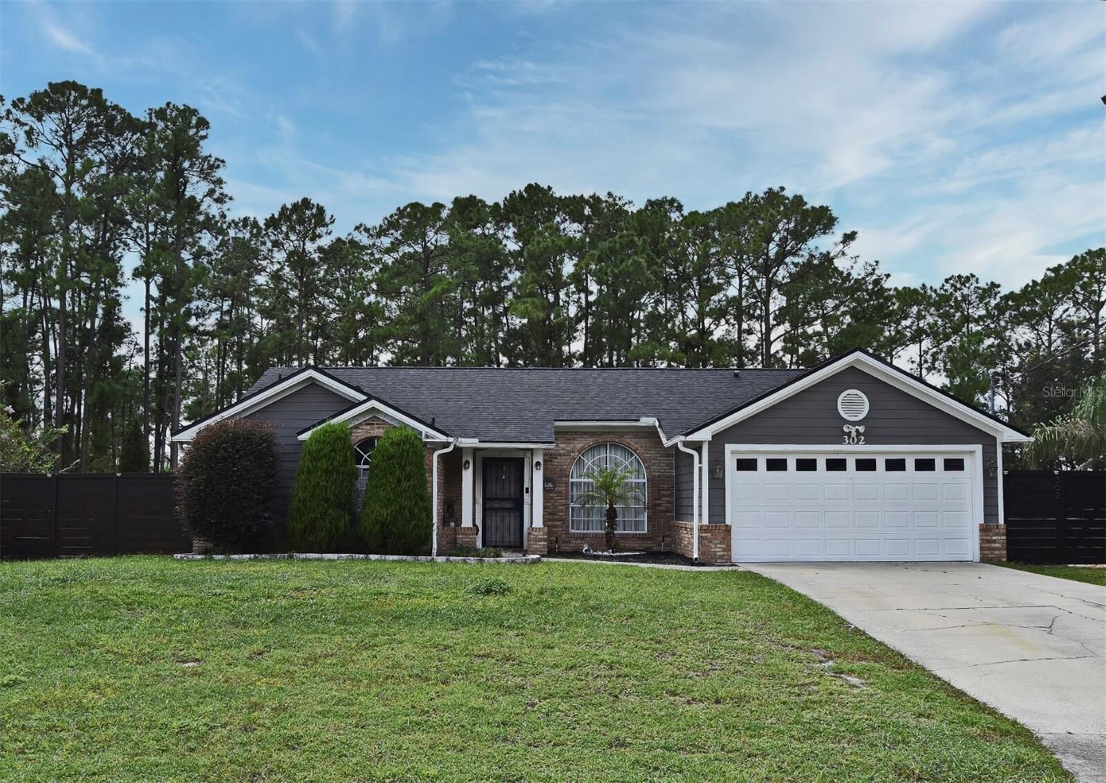 Property Photo:  302 Shadydale Court  FL 32738 