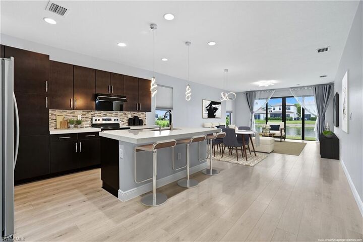 Property Photo: 8992 Madrid Cir FL 34104