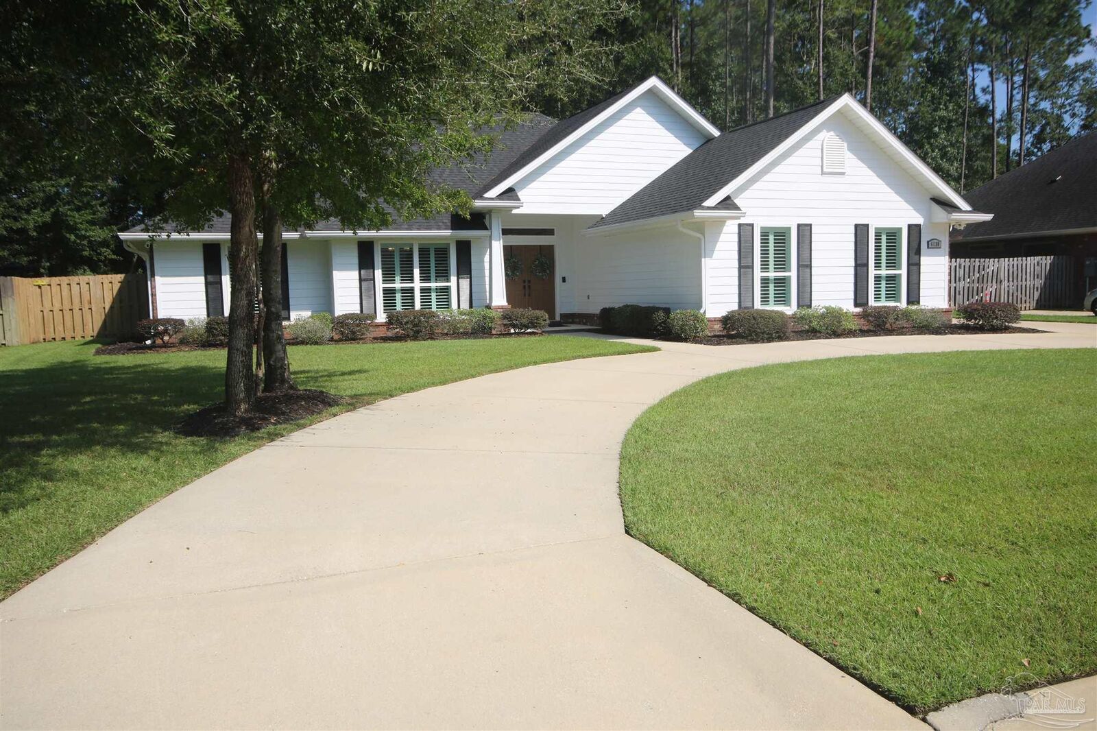 Property Photo:  6130 Dollarweed Dr  FL 32571 