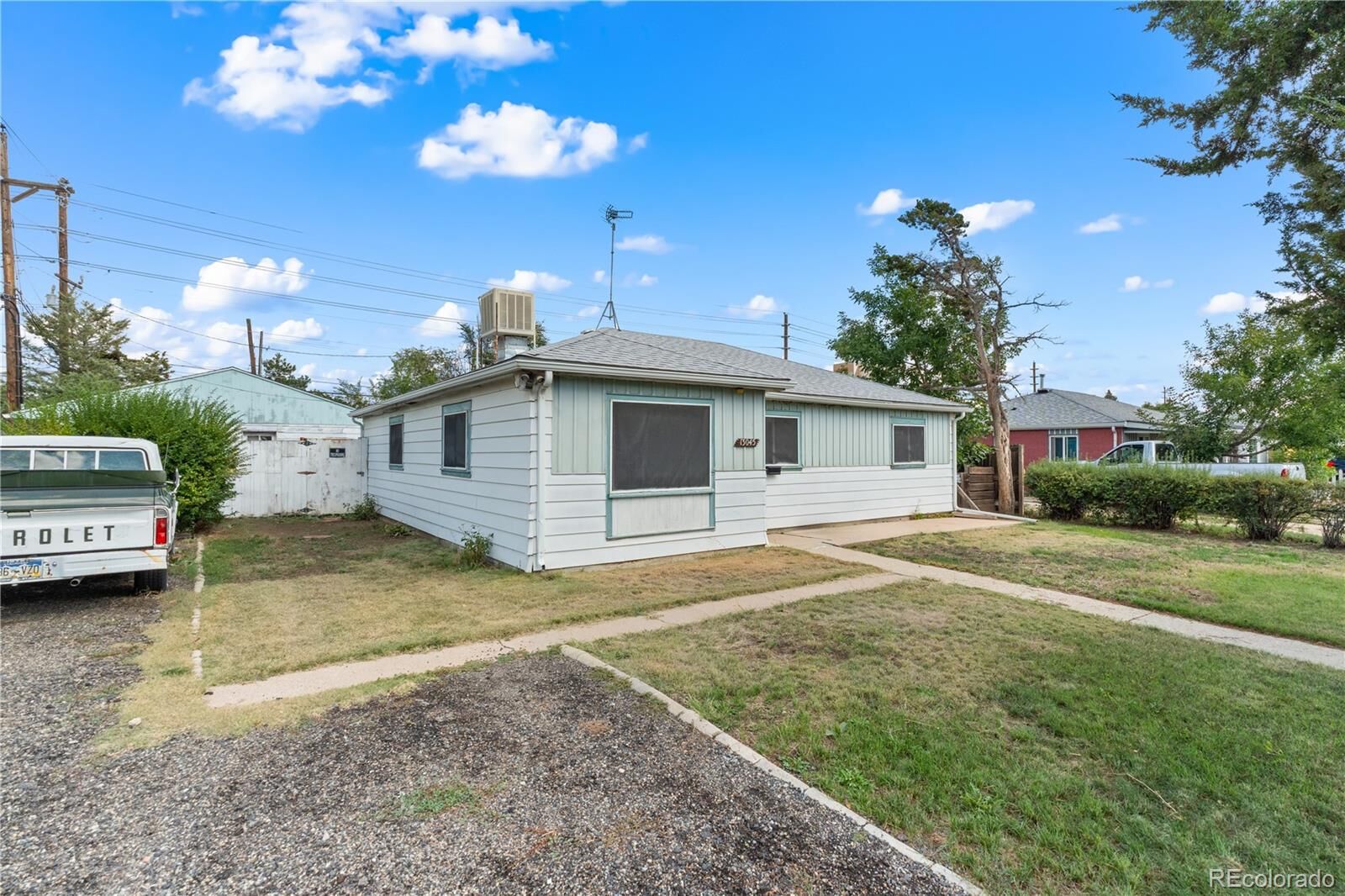 Property Photo: 13045 E 13th Avenue CO 80011