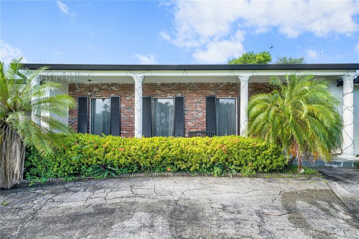 Property Photo:  801 NW 203rd St  FL 33169 