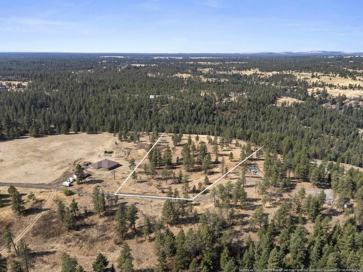 Property Photo:  42xx E Rambling Rose Ln  WA 99036 