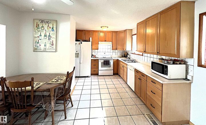 Property Photo:  8507 8509 128 Avenue NW  AB T5E 0E9 