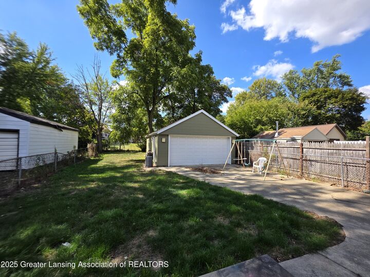 Property Photo:  1417 N Jenison Avenue  MI 48915 