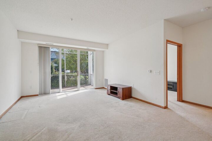Property Photo:  100 Clydesdale Trail 115  MN 55340 