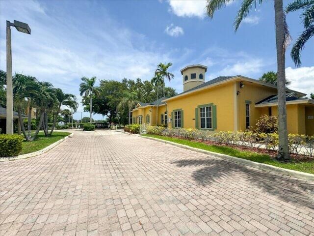Property Photo:  1104 Meadows Circle 1104  FL 33436 