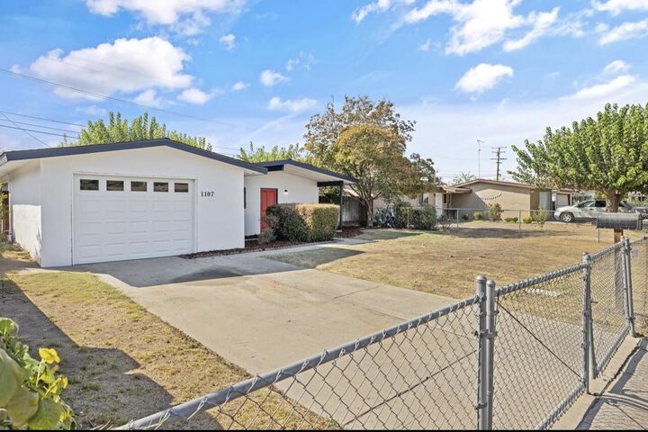 Property Photo: 1107 N Enos Street CA 93292